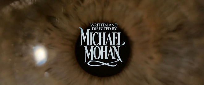IMAGE: "Written and Directed by Michael Mohan" card