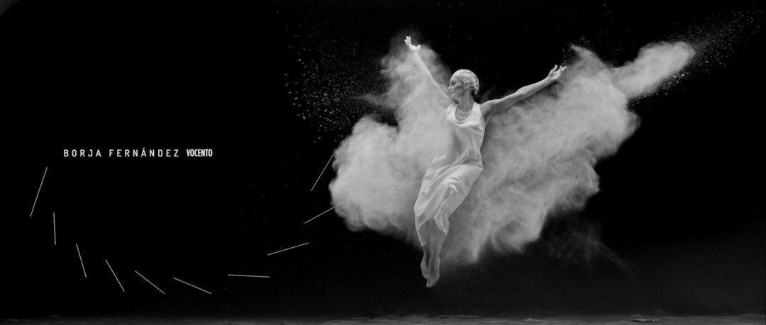 IMAGE: Still – female dancer throwing flour