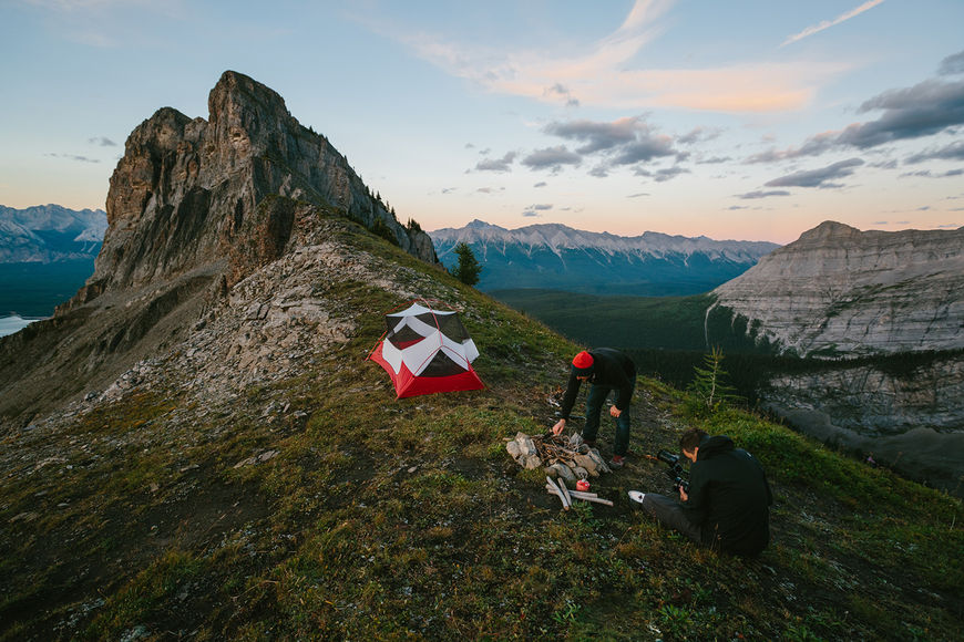 IMAGE: Photograph – tent and campfire setup