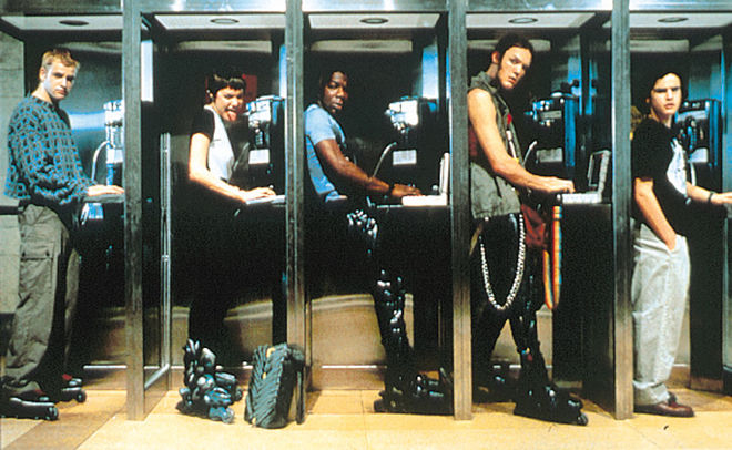 IMAGE: Photograph of the cast from Hackers at phone booths
