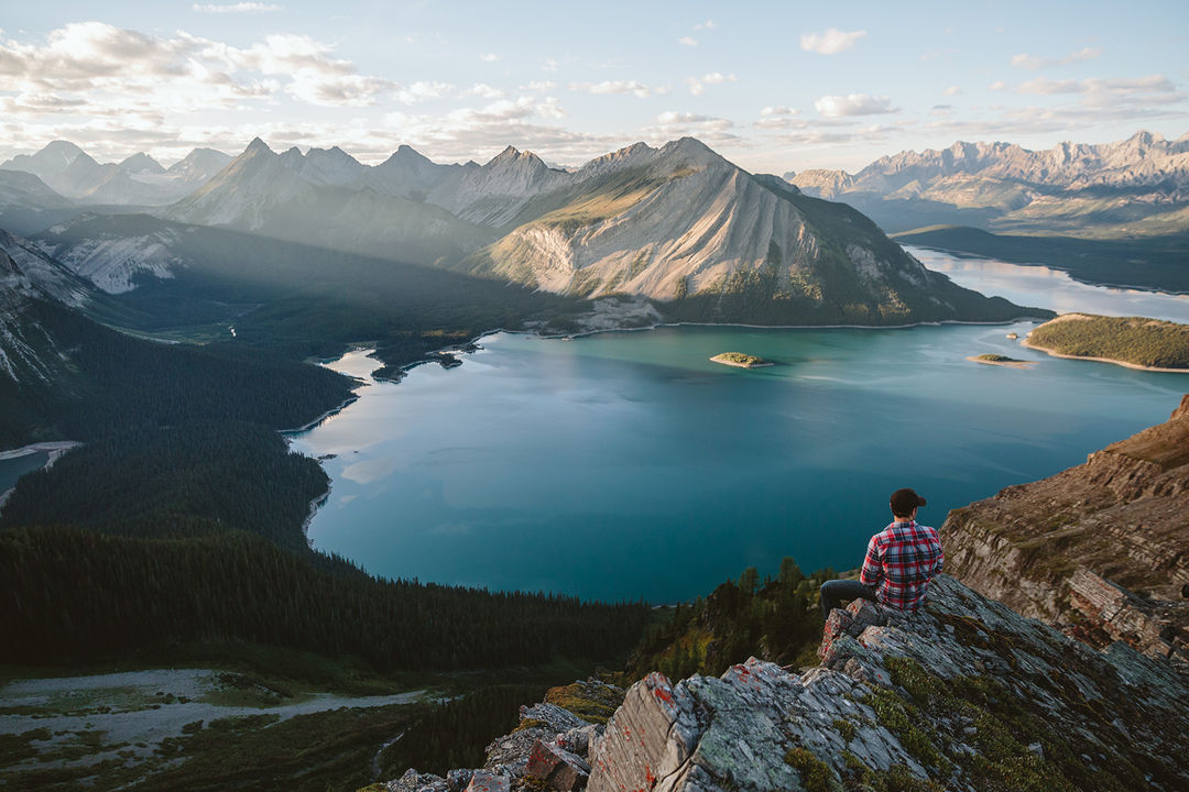 IMAGE: Photograph – Mark sitting on the cliff edge