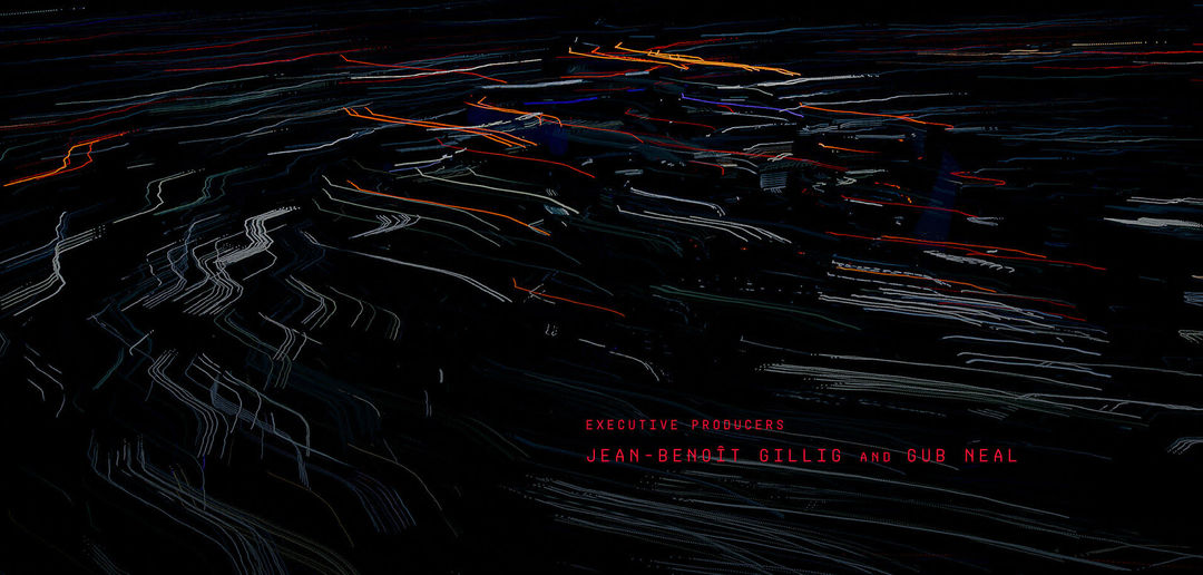 IMAGE: Still - Glitch effect on top of footage with the credits Executive Producers Jean-Benoît and Gub Neal